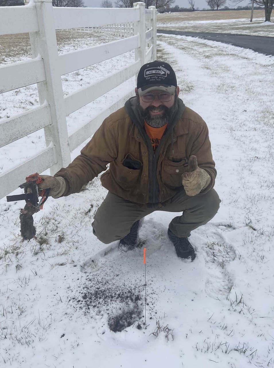 Justin Garrison catching moles in the snow.